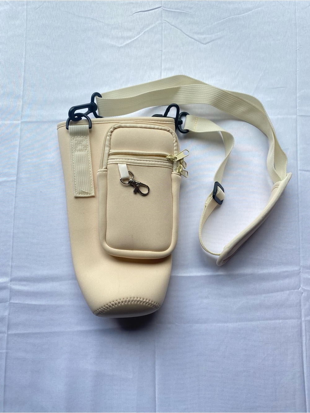 Cream Neoprene Crossbody Bottle Holder Bag with Front Pocket for keys